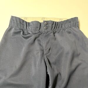 Intensity brand women’s softball pants. Navy blue, size M. Good used condition